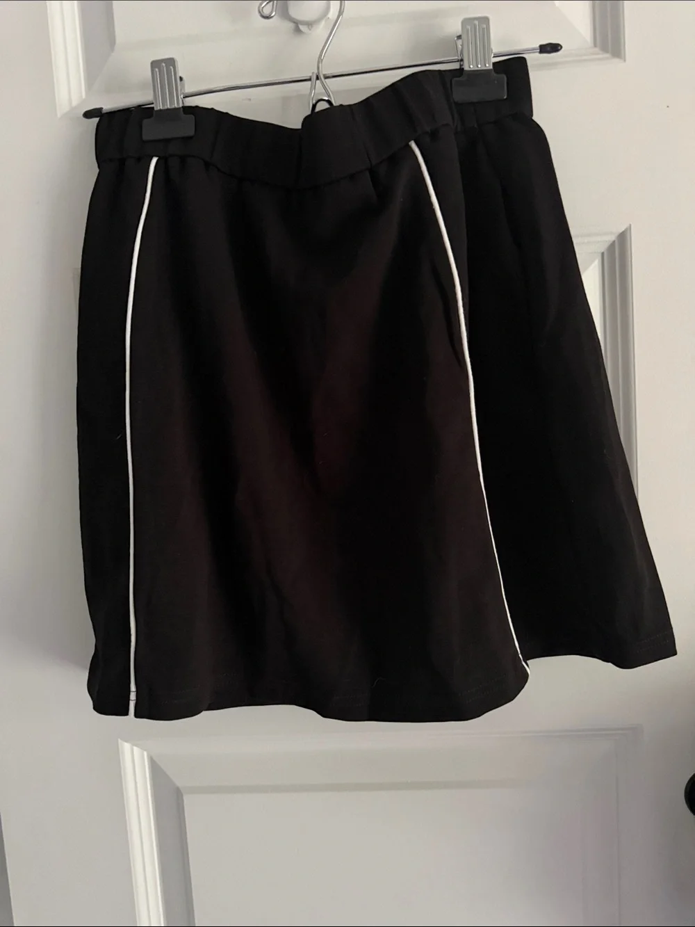 Athleisure black with white piping top and skort set